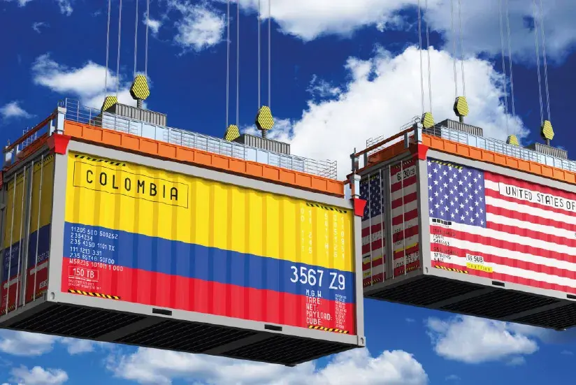 Banderas de Colombia y Estados Unidos, uno de los destinos con TLC, en contenedores de mercancía.
